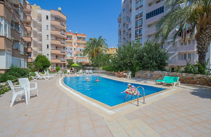 3 værelses billig strandlejlighed til salg i Tosmur Alanya -115000 Euro